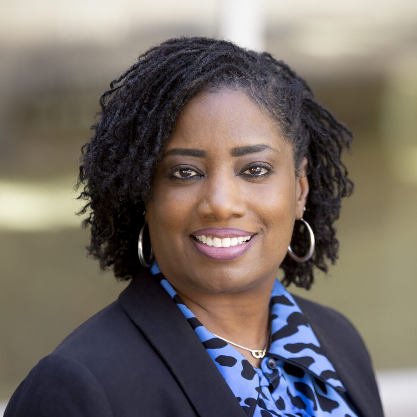 Tanisia Burton Revis O scaled e1753824393545